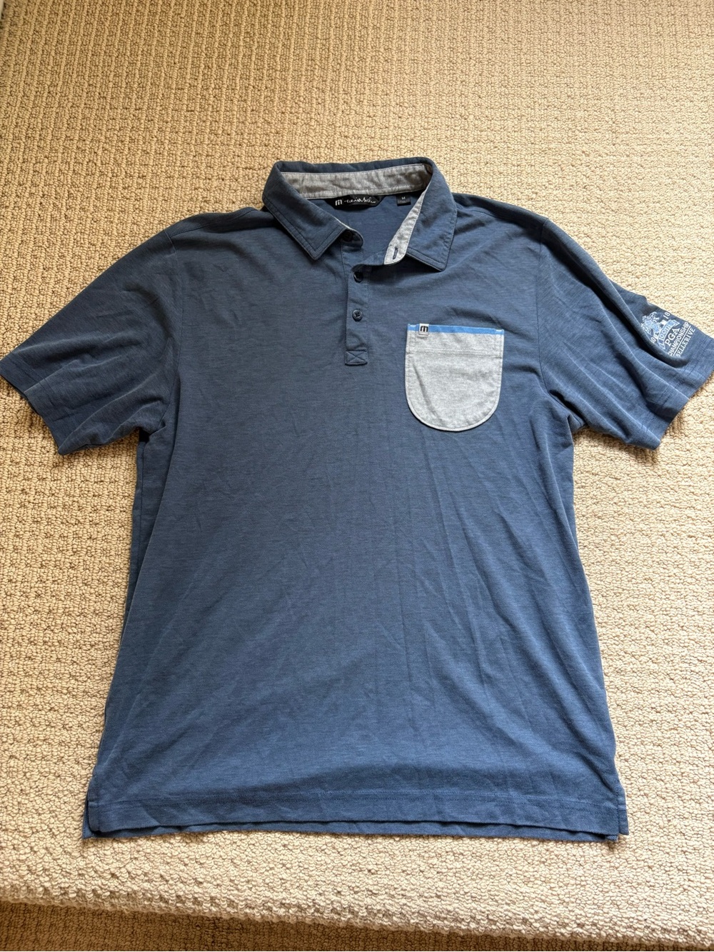 Travis Mathew Navy Polo with Light Gray Contrast Pocket